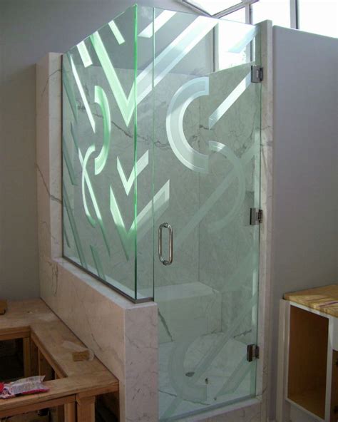 The use of stone tiles in the shower adds a surprising element that breathes life into the room. 17 Streamlined Modern Glass Shower Designs