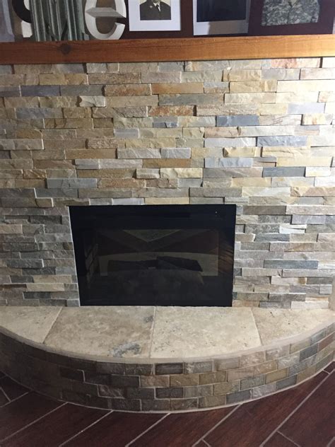 Added Stack Stone Tiles On The Curved Hearth And Rustic Redwood Shelf