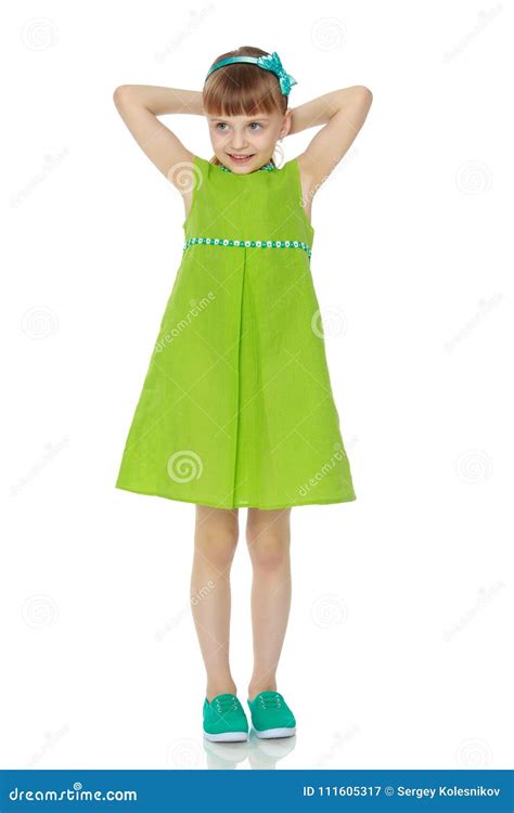 The Girl Is Holding Her Hands Behind Her Head Stock Image Image Of Positive Lovely 111605317