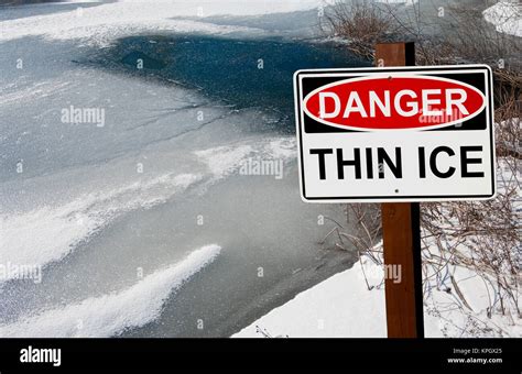 Thin Ice Warning Sign Stock Photo Alamy