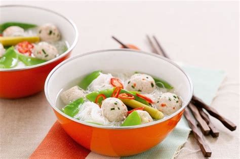 Transform chicken mince and stock into a filling and healthy chicken noodle soup with crispy chicken meatballs. Rice noodle soup with thai chicken meatballs | Chicken ...