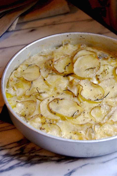 When the potatoes are cooked in a bag they come out of the oven with soft pliable skins that can be peeled off with your fingers once they have cooled. Baked Potatoes in Garlic Cream - Always Order Dessert