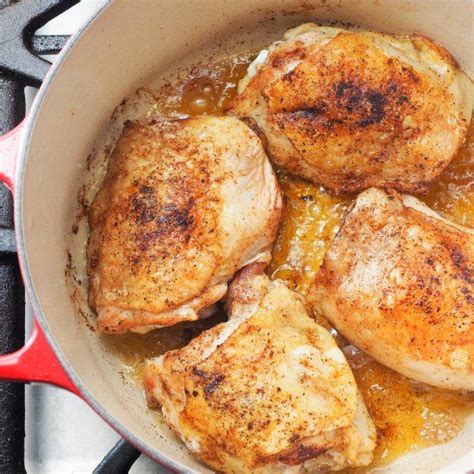 One Pot Dutch Oven Recipe For A Spicy Coconut Braised Chicken Thigh