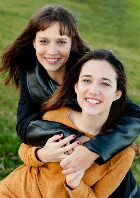 Outdoor Portrait Of Two Happy Sisters Stock Photo Image Of Funny
