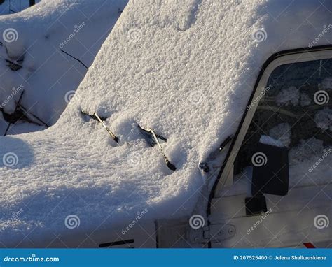 Snow Covered Car Windshield And Frozen Wipers Stock Photo Image Of