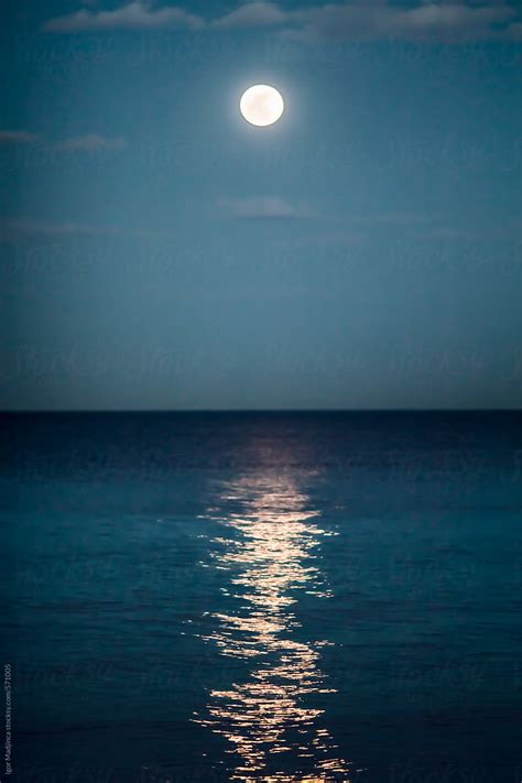 Nightreflection Of The Full Moon In The Sea Colorful Stocksy United