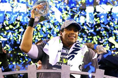 Russell Wilson With The Lombardi Trophy Super Bowl Xlviii 020214 New