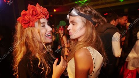 sexy lesbian at halloween party in nightclub flower rim aviator sunglasses stock video footage
