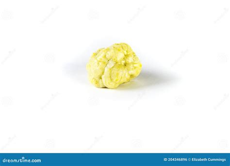 Piece Of Chewed Yellow Bubble Gum Isolated Over White Stock Photo