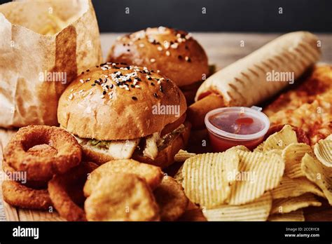 Unhealthy And Junk Food Different Types Of Fastfood And Snacks On The