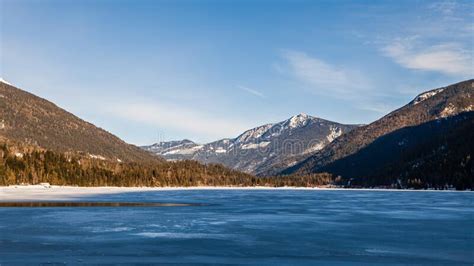 Frozen And Snow Covered Three Valley Lake British Columbia Clouds On