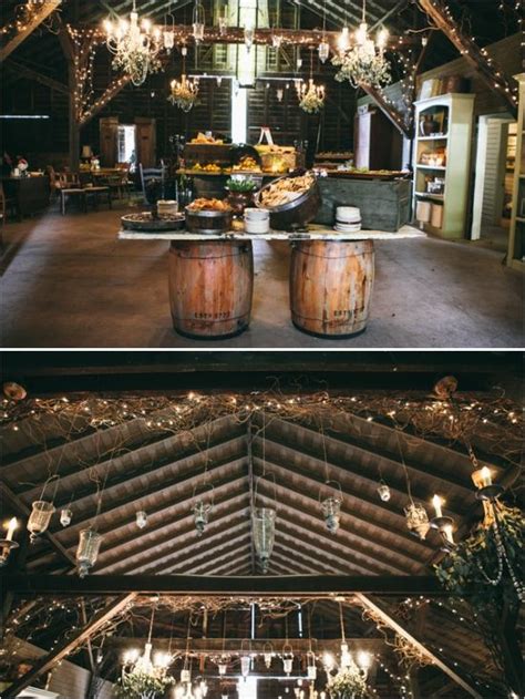 Barn Reception With Chandelier Lighting And Wine Barrel