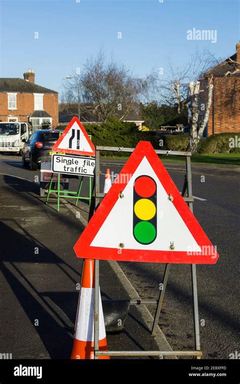 Temporary Traffic Lights Warning Sign At Roadworks High Resolution