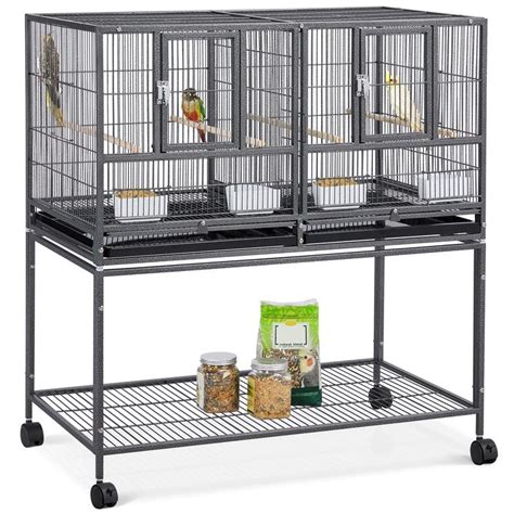 Three Cages With Food In Them And One On Top Of The Cage Is Filled With