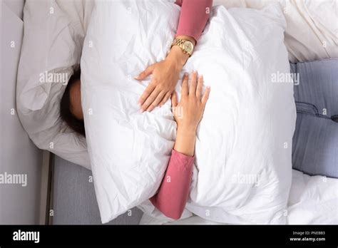 Woman Holding Pillow Face Hi Res Stock Photography And Images Alamy