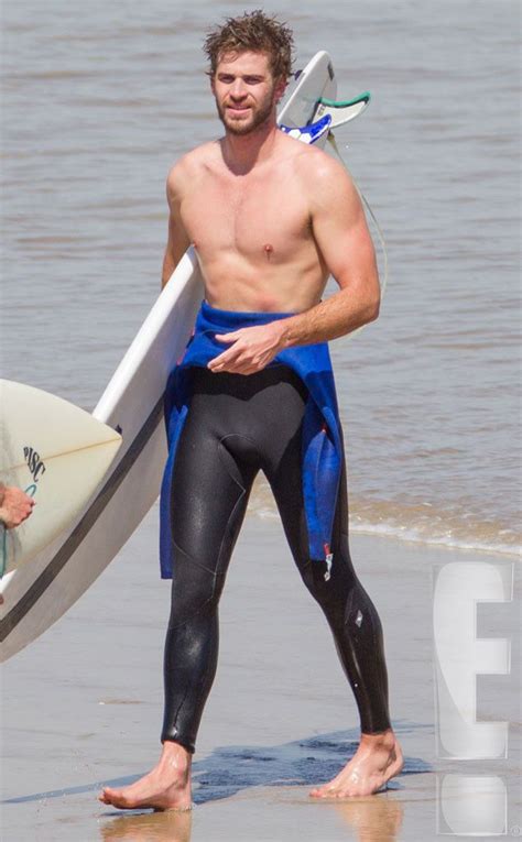 Liam Hemsworth Is Shirtless Surfing And Showering—see The Exclusive