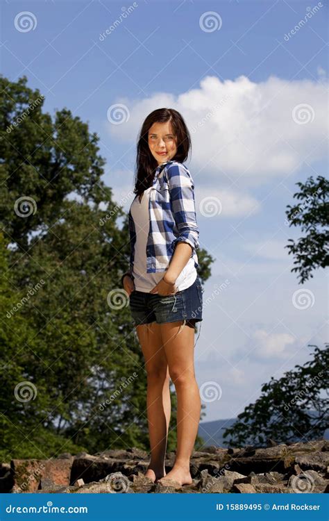 Stunning Sly Brunette Woman In Denim Dress Thinking Over Mysterious