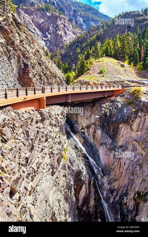 Road Over Waterfall Down Large Mountain Of Gray Rock Stock Photo Alamy