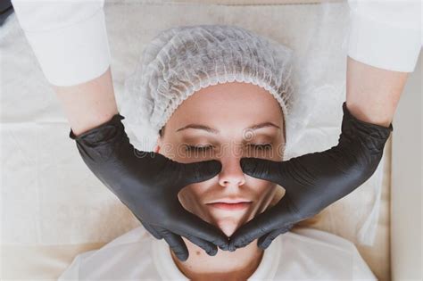 Doctor Beautician Makes A Facial Massage To A Young Woman Stock Image Image Of Cosmetic