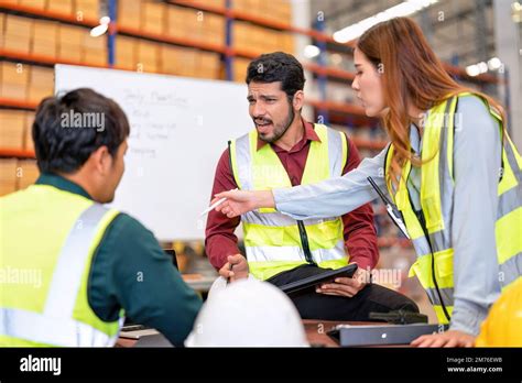 Group of worker in the warehouse factory conduct toolbox talk daily