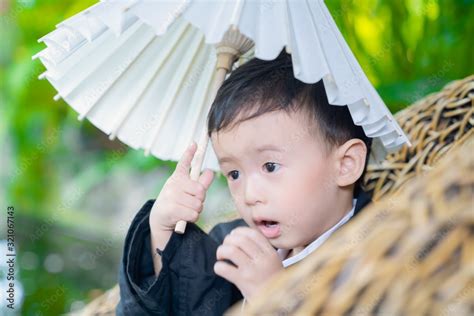 Asian Little Boy Wearing Yukata In Graden Stock Photo Adobe Stock