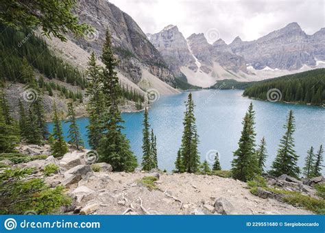 Moraine Lake In Cloudy Day In Summer In Banff National Park Stock Photo