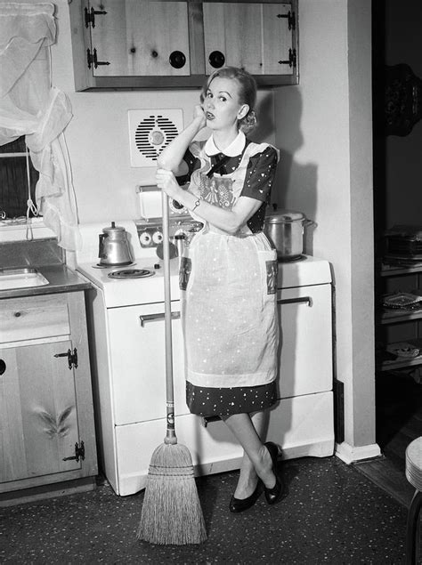 1950s Tired Housewife In Apron Standing Photograph By Vintage Images