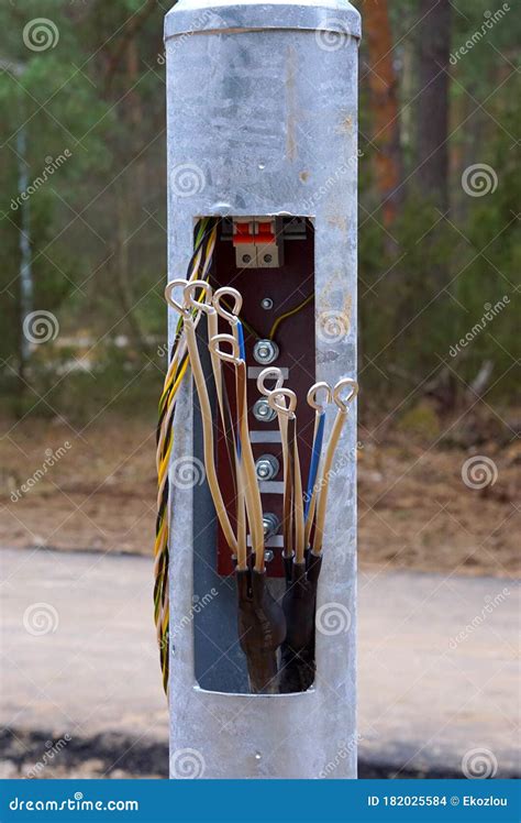 Electric Wires Stick Out From A Street Lighting Pole New Electrical