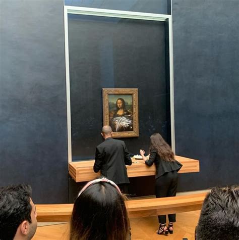 Mona Lisa Attacked In Louvre With Cake By Man Wearing Wig