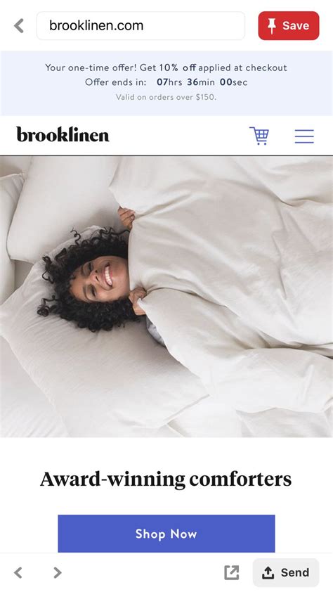 A Woman Laying In Bed Under A White Comforter With The Words Brooklyn On It