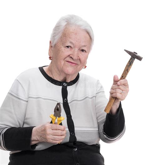 Old Woman Holding Hammer And Pliers Stock Photo Image 38854122