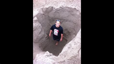 deepest sand hole at the beach ever sand pit fun youtube