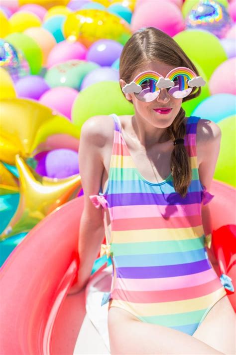 How To Throw An Epic Pool Birthday Party Pool Birthday Party Rainbow Balloons Pool Party