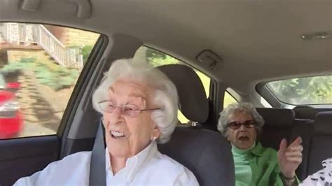a police officer pulls over a car full of old women