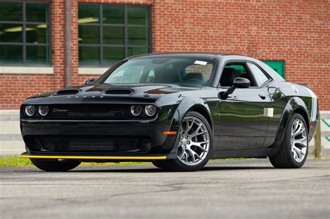 The Iconic Black Ghost Dodge Challenger And Its Modern Successor Are