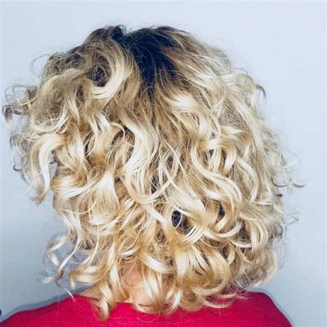 Believe it or not, a little frizz is in these days, so don't be afraid to sport your natural texture. 25 Best Shoulder Length Curly Hair Cuts & Styles in 2020