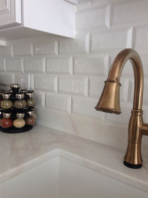 This finish complements nearly any bathroom color scheme. Champagne bronze delta Cassidy faucet. Cobsa white bevel ...
