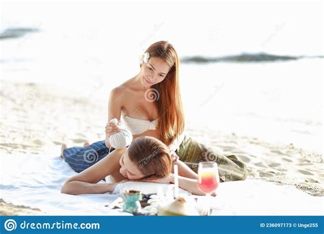 Two Asia Women Doing Spa Massage Together On The Beach Stock Image Image Of People Female