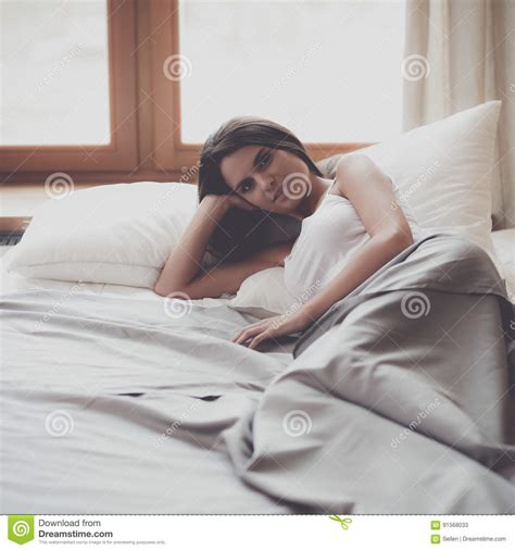 Beautiful Brunette Lying On Bed At Home Stock Image Image Of Hair