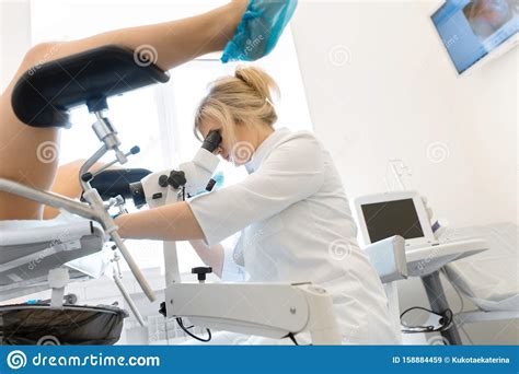 A Gynecologist Examines A Patient On A Gynecological Chair Workflow Of