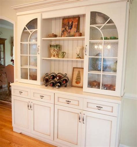 Kitchen cabinets with glass doors are for those who like to turn these lovely shelves into showcases. Storage Cabinet with Glass Doors - HomesFeed