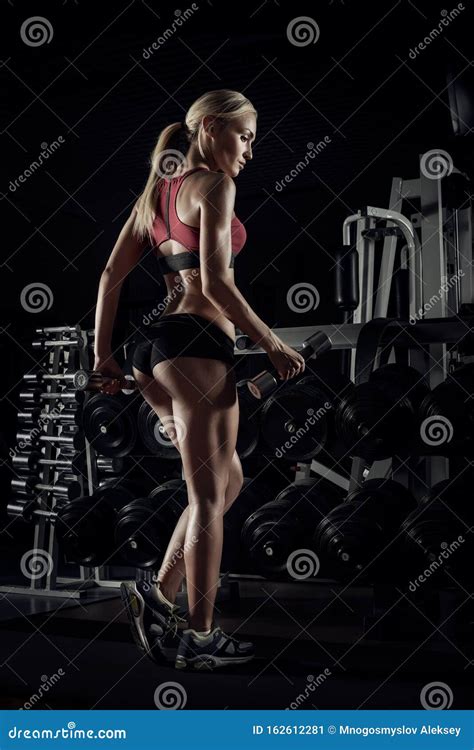 Beautiful Woman Bodybuilder In Gym Stock Image Image Of People
