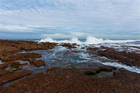 Waves Breaking On A Rocky Seashore At The Atlantic Ocean Stock Photo