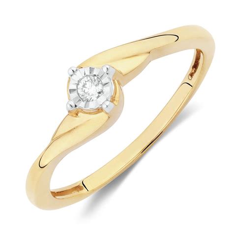 A Commitment Captured In Diamonds This Gorgeous 10ct Yellow Gold Promise Ring Features A Single
