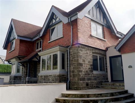 Pebble Grey Composite Windows Complements Anthracite Grey Doors In