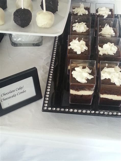 Black And White Dessert Table Cheesecake And Chocolate Cake Combo
