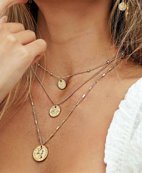 the 2021 biggest jewelry trend multi layered necklaces