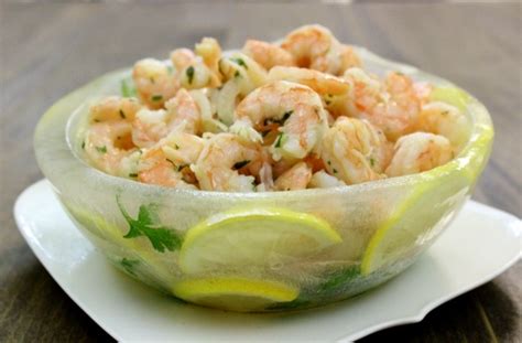 Increase heat to medium and cook, tossing constantly, 3 minutes or until shrimp just turn pink and begin to curl. Marinated Shrimp In A Lemon Herb Ice Bowl - Olga's Flavor ...