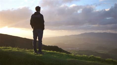 Man On A Mountain Looking At The Landscape Image Free Stock Photo