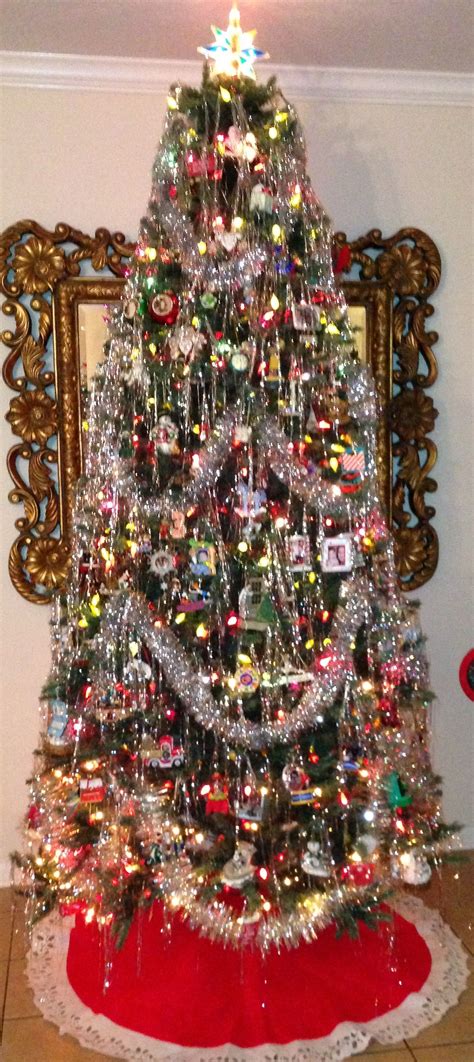 You can make bowknots and pendants using satin ribbons, sequins, dried oranges, pine cones, and more. Retro Christmas Tree with ice sickles. (With images ...